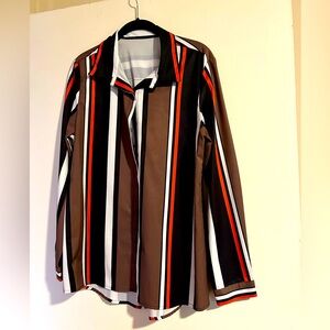 Striped brown, orange, black and white blouse. Button front